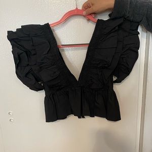 Ruffle sleeve top with zipper back
